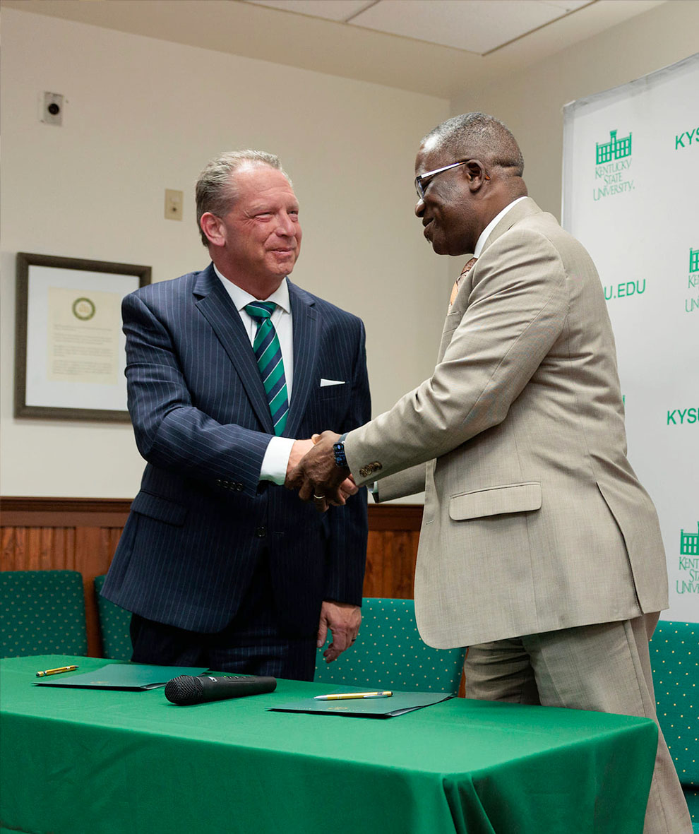 Dr. Koffi Akakpo shaking hands for the KCTCS Partnership